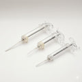 Syringe with white soft tube